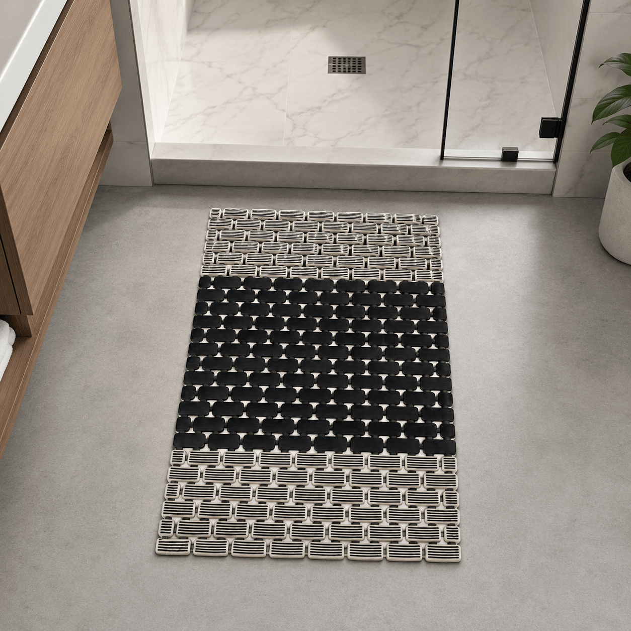 Black and beigi shower mat placed